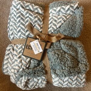 White and sage green soft blanket